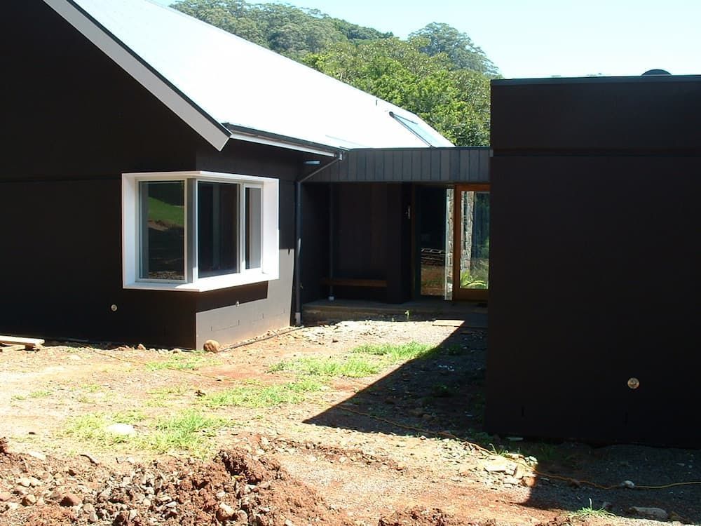 A Black House With A White Window And A White Roof — South Coast Glass In South Nowra, NSW