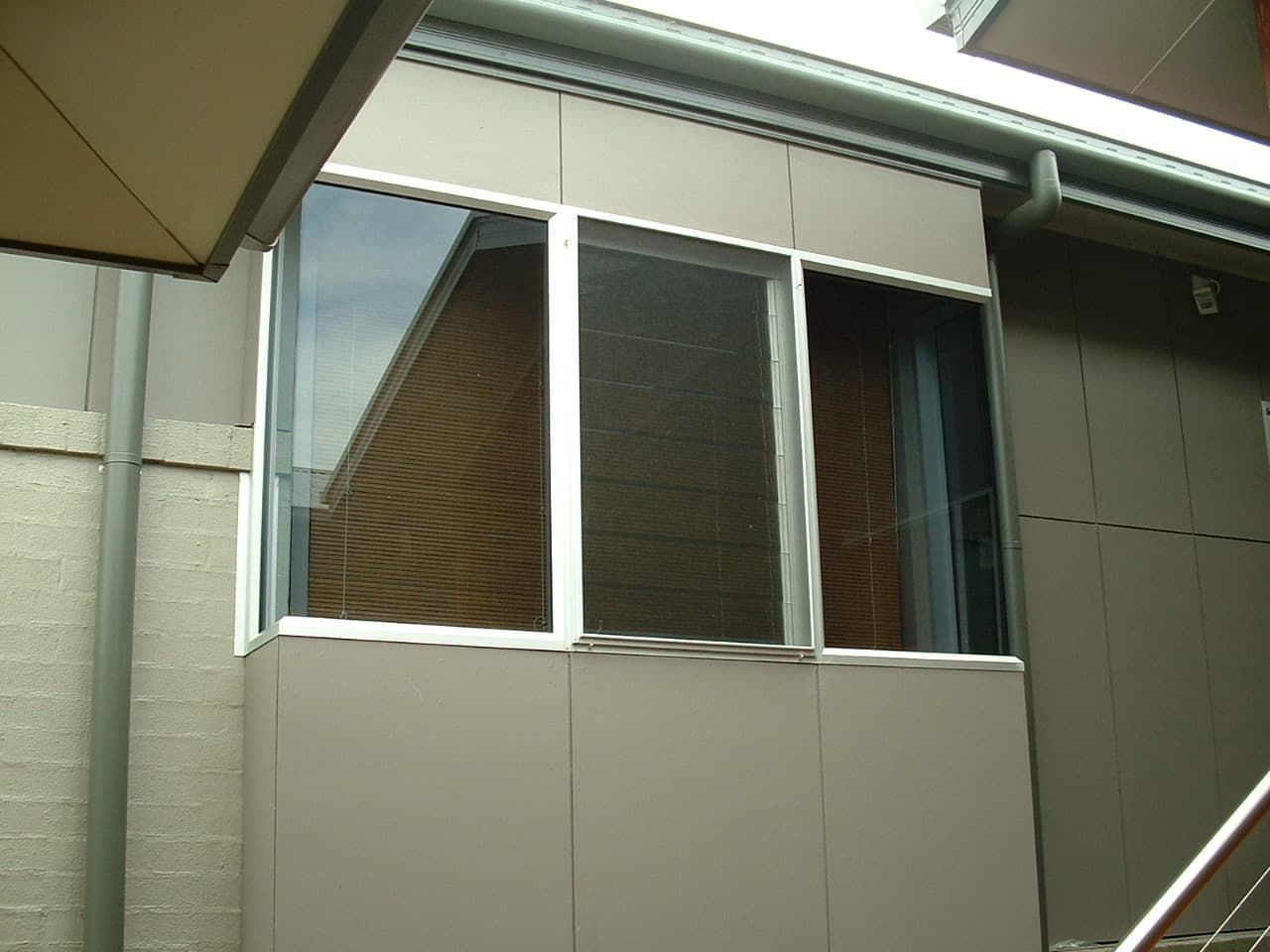 A Building With A Lot Of Windows On It — South Coast Glass In South Nowra, NSW