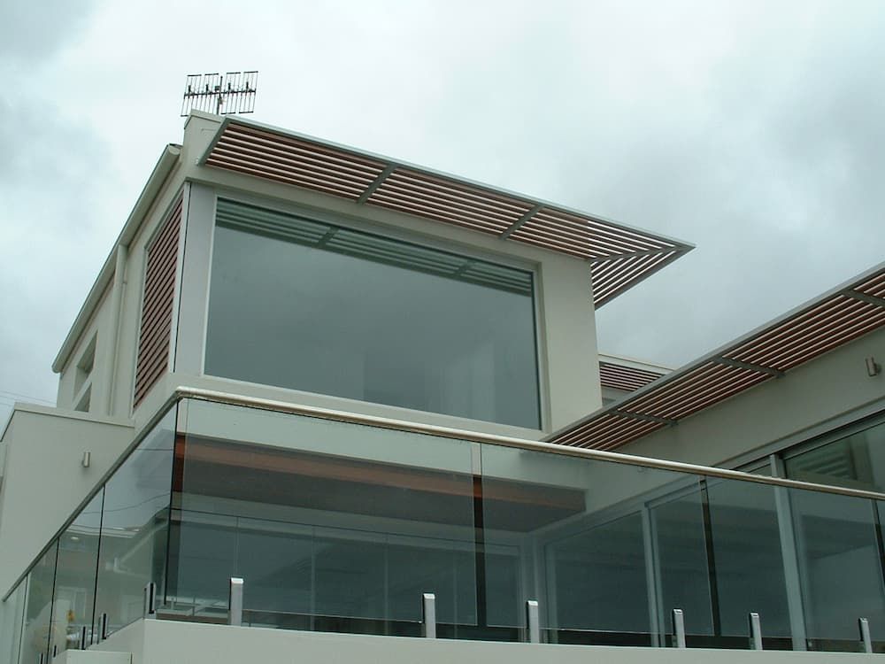 A House With A Balcony And A Large Window — South Coast Glass In South Nowra, NSW