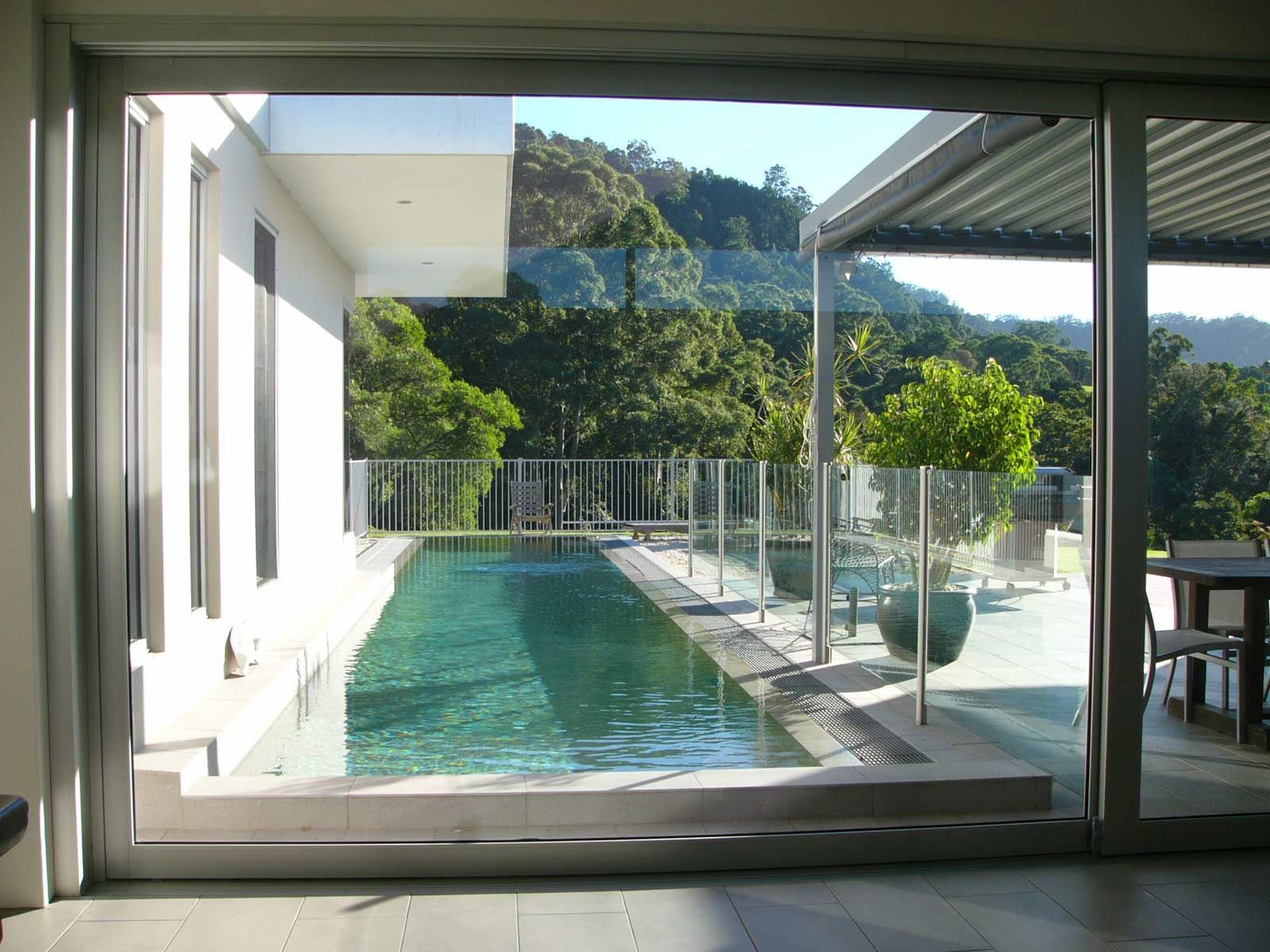 A Clean and Modern Pool with Glass Fencing — South Coast Glass In South Nowra, NSW