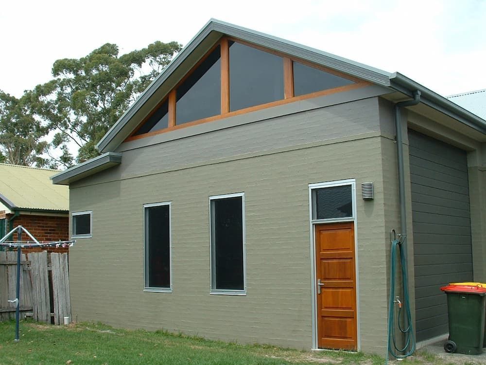 A House With A Roof That Has A Triangle On It — South Coast Glass In South Nowra, NSW