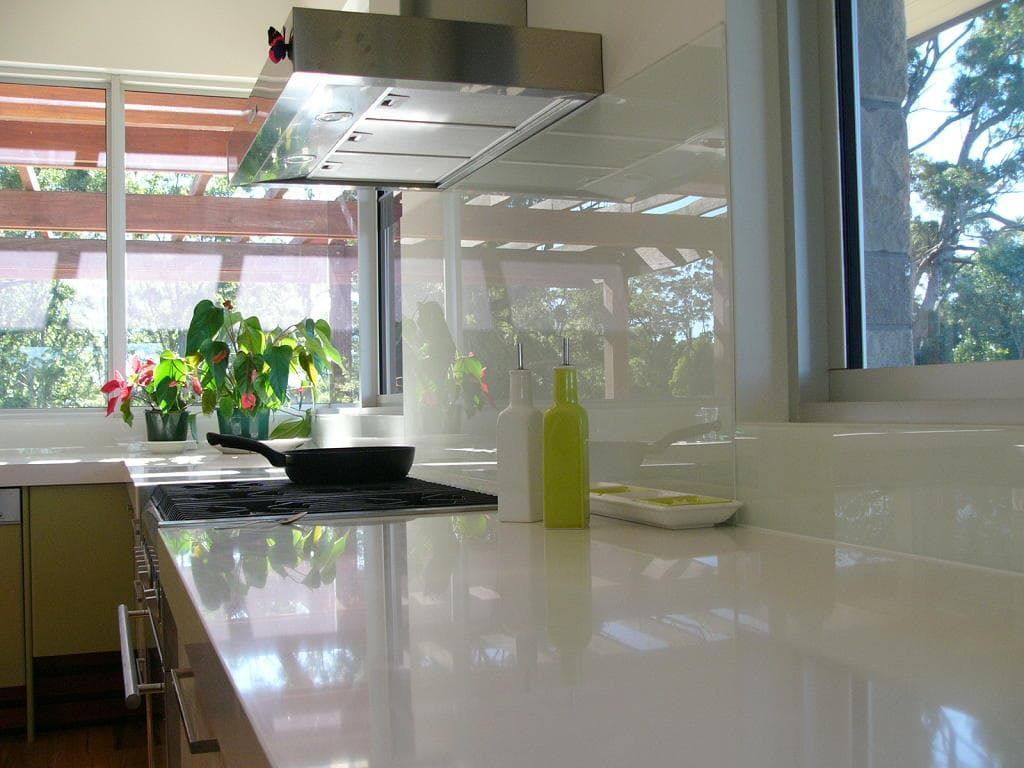 A Kitchen With A Stove Top Oven And A Window — South Coast Glass In South Nowra, NSW