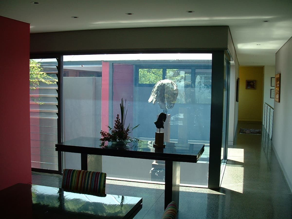 A Room With A Table And Chairs And A Large Window — South Coast Glass In South Nowra, NSW