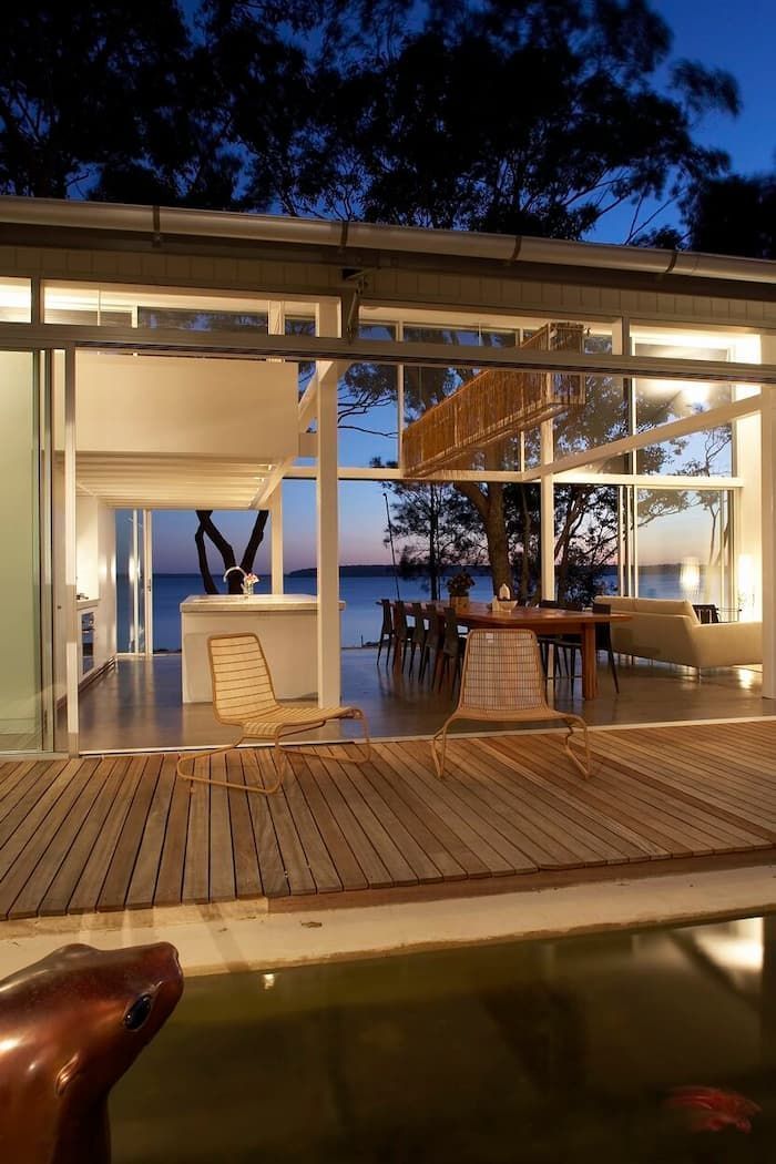 A House With A Swimming Pool In Front Of It — South Coast Glass In South Nowra, NSW