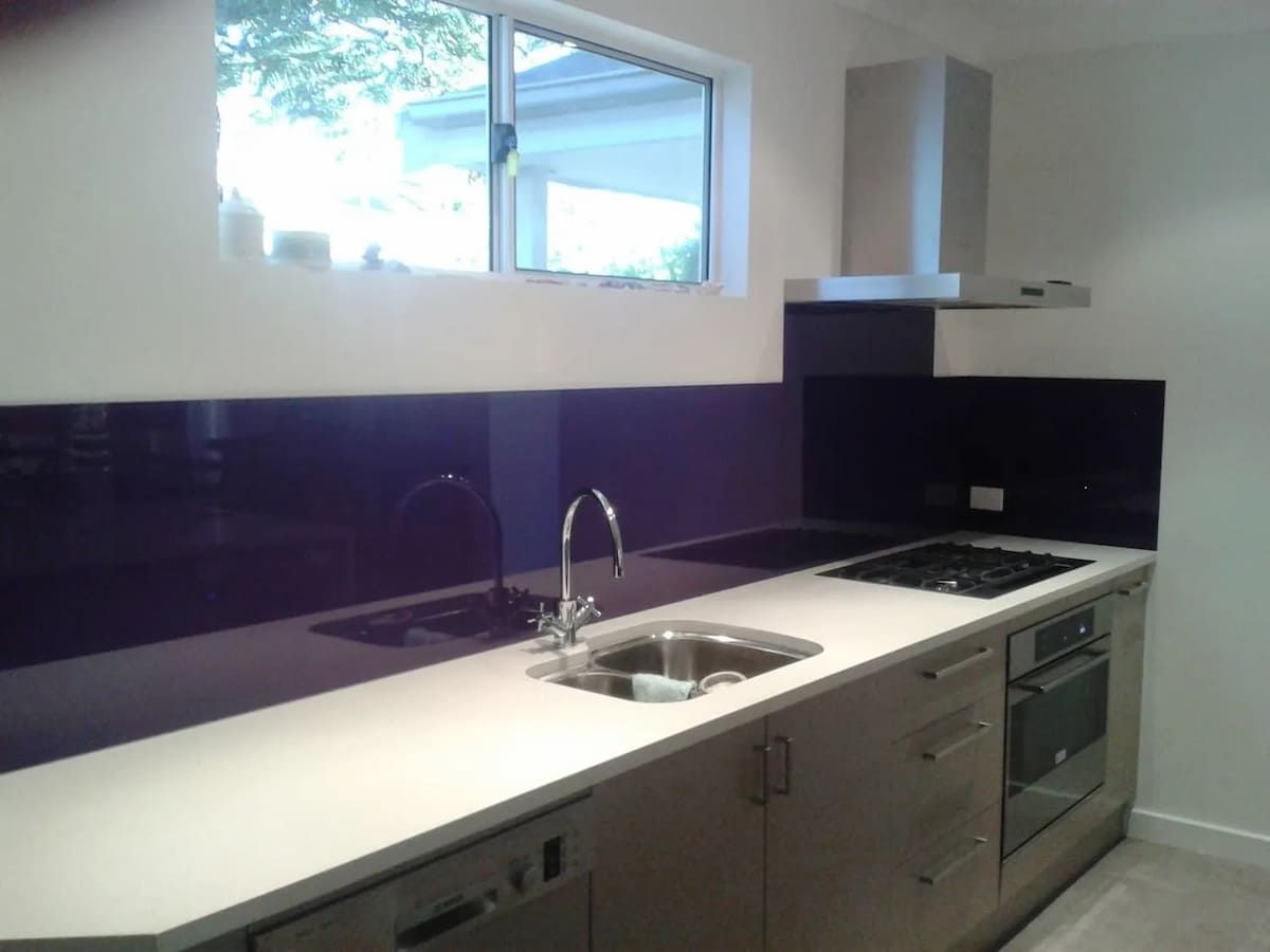 A Kitchen With A Sink Stove And A Window — South Coast Glass In South Nowra, NSW