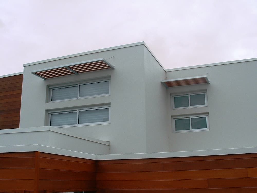A Large White Building With A Lot Of Windows — South Coast Glass In South Nowra, NSW