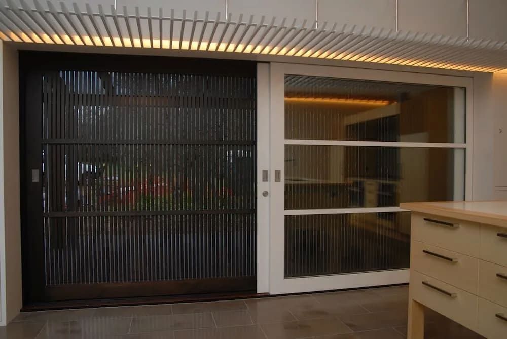 A Room With A Sliding Glass Door And A Desk — South Coast Glass In South Nowra, NSW