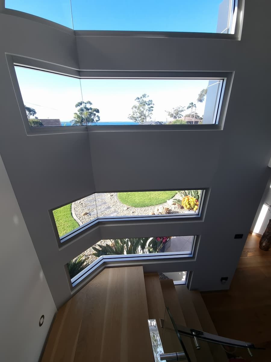 A Room With A Lot Of Windows And Stairs — South Coast Glass In South Nowra, NSW