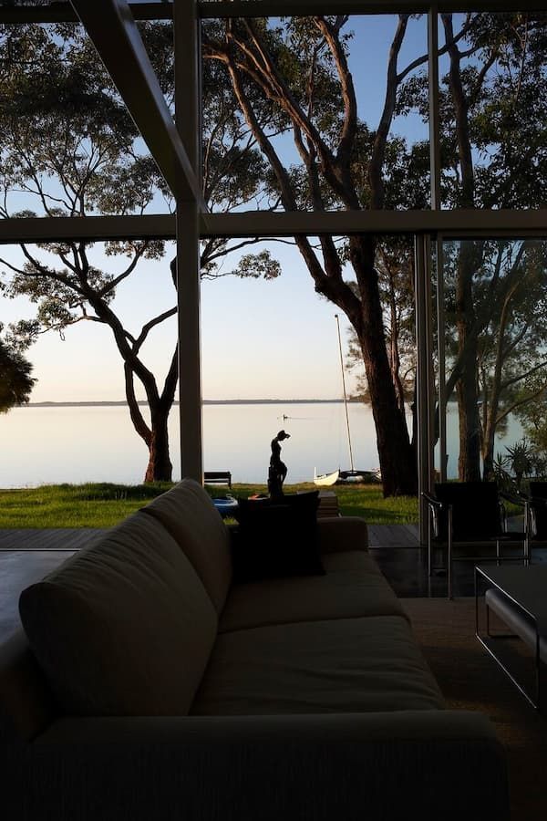 A Living Room With A Couch And A View Of A Lake — South Coast Glass In South Nowra, NSW
