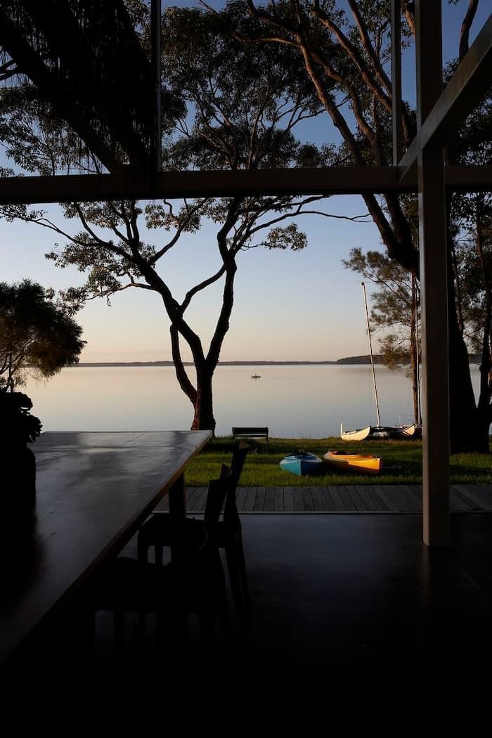 A View Of A Lake Through A Window With Trees In The Foreground — South Coast Glass In South Nowra, NSW