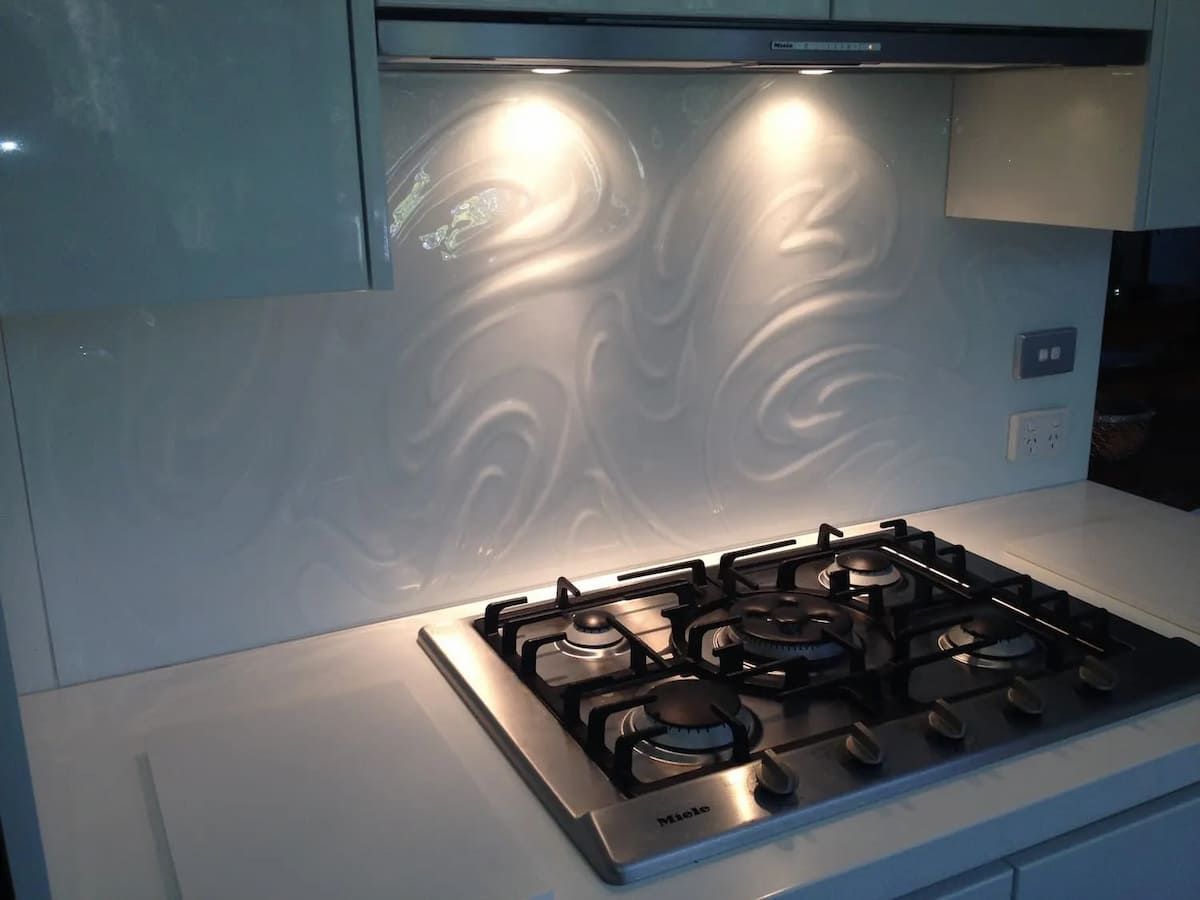 A Kitchen With A Stove Top Oven And A Hood — South Coast Glass In South Nowra, NSW
