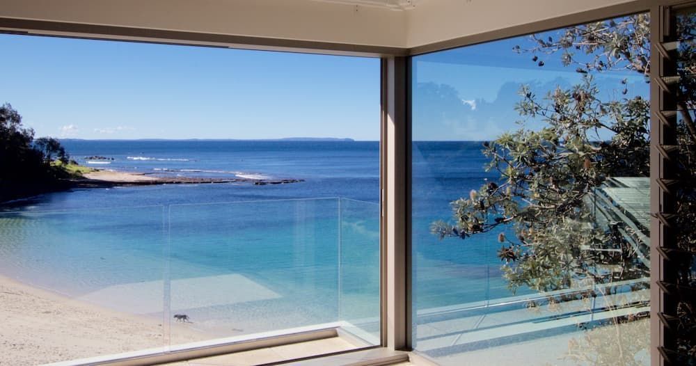 There Is A Large Window With A View Of The Ocean — South Coast Glass In South Nowra, NSW