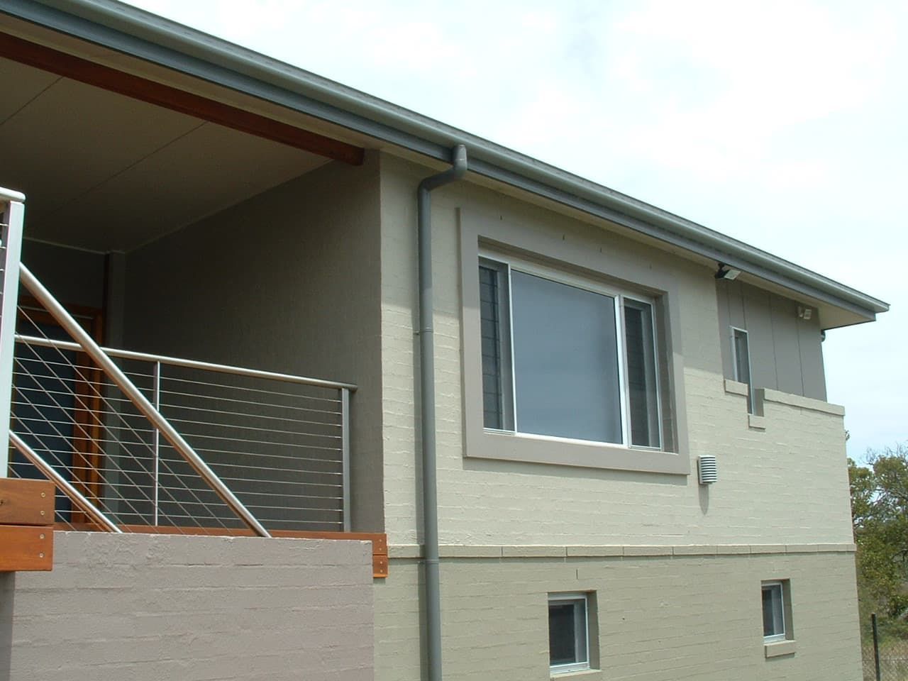 A House With A Balcony And Stairs On The Side — South Coast Glass In South Nowra, NSW