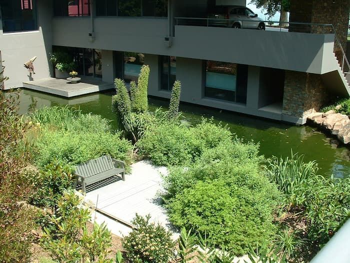 A Building With A Pond In The Middle Of It — South Coast Glass In South Nowra, NSW