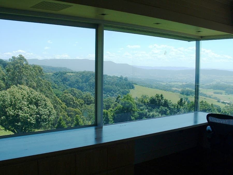 A Large Window With A View Of Trees And Mountains — South Coast Glass In South Nowra, NSW