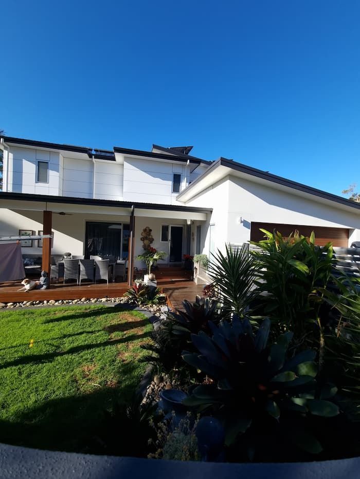 A Large White House With A Large Lawn In Front Of It — South Coast Glass In South Nowra, NSW