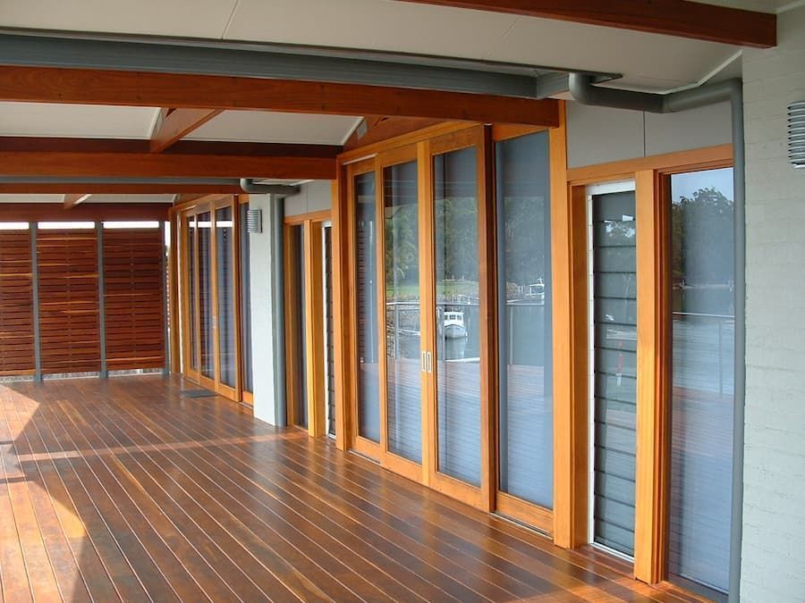 A Room With A Lot Of Windows And A Wooden Floor — South Coast Glass In South Nowra, NSW