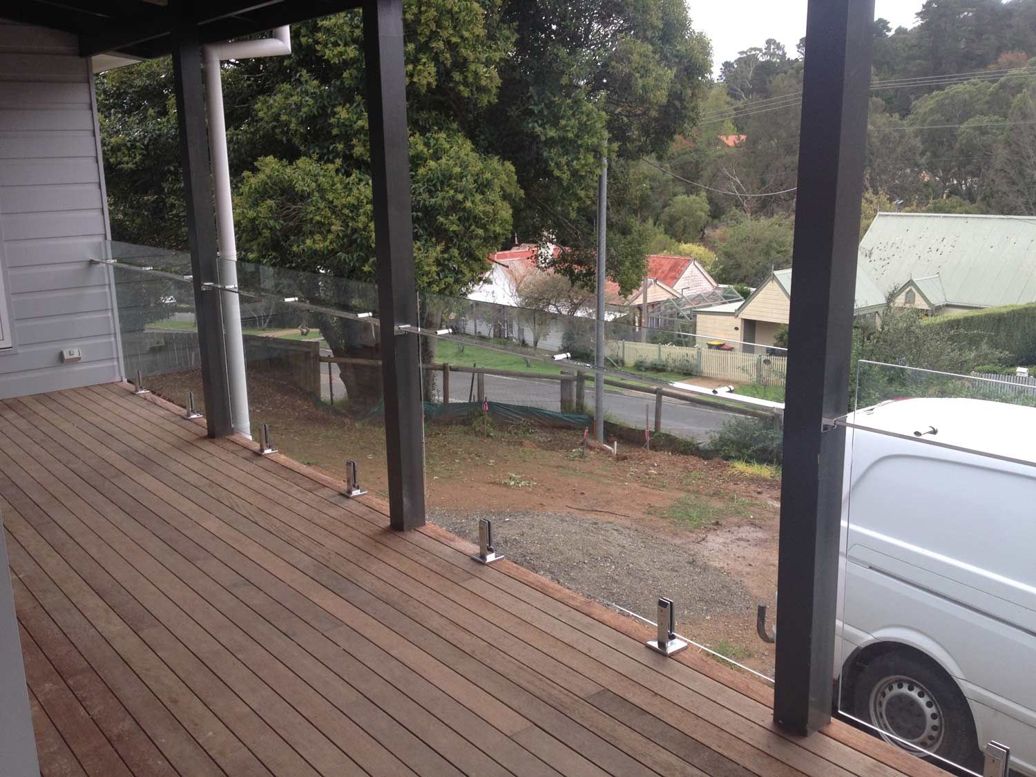 Installing Balustrades and Wood Flooring — South Coast Glass In South Nowra, NSW