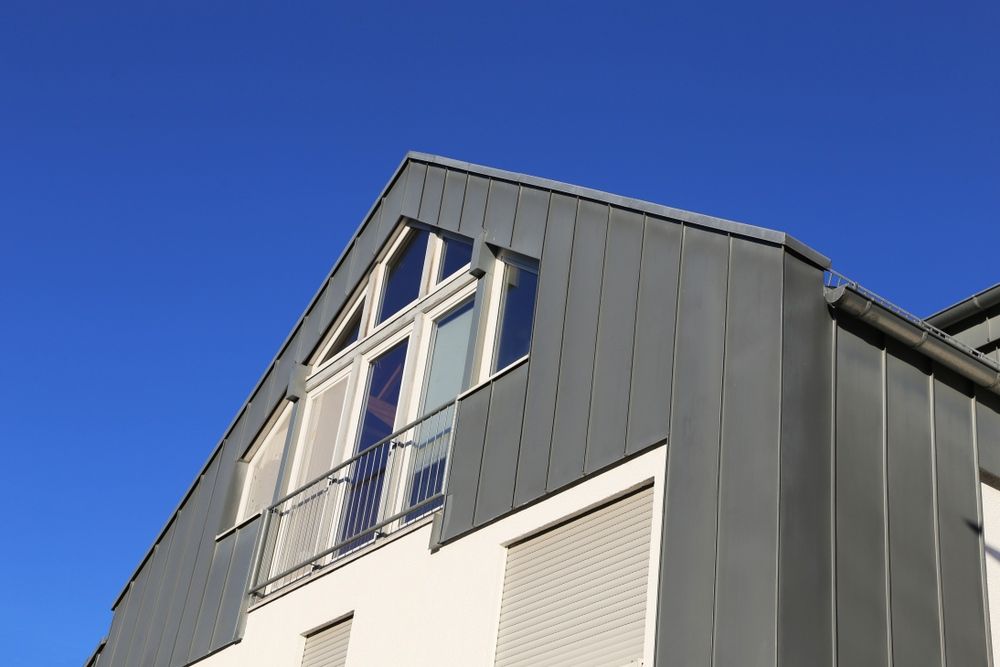 A Building With a Balcony and a Blue Sky in the Background — All Clean Pressure Cleaning in Toronto, NSW