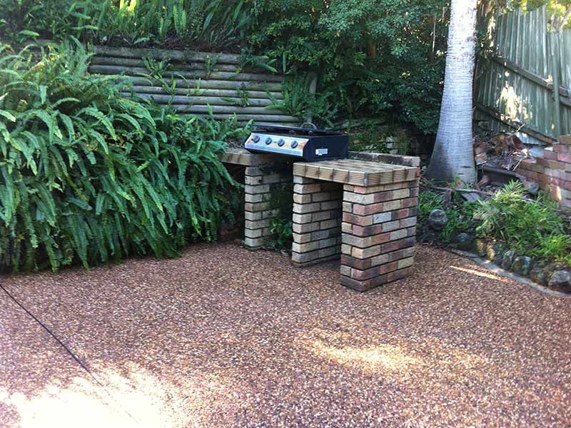 A Grill is Sitting on a Brick Counter in a Backyard — All Clean Pressure Cleaning in Valentine, NSW