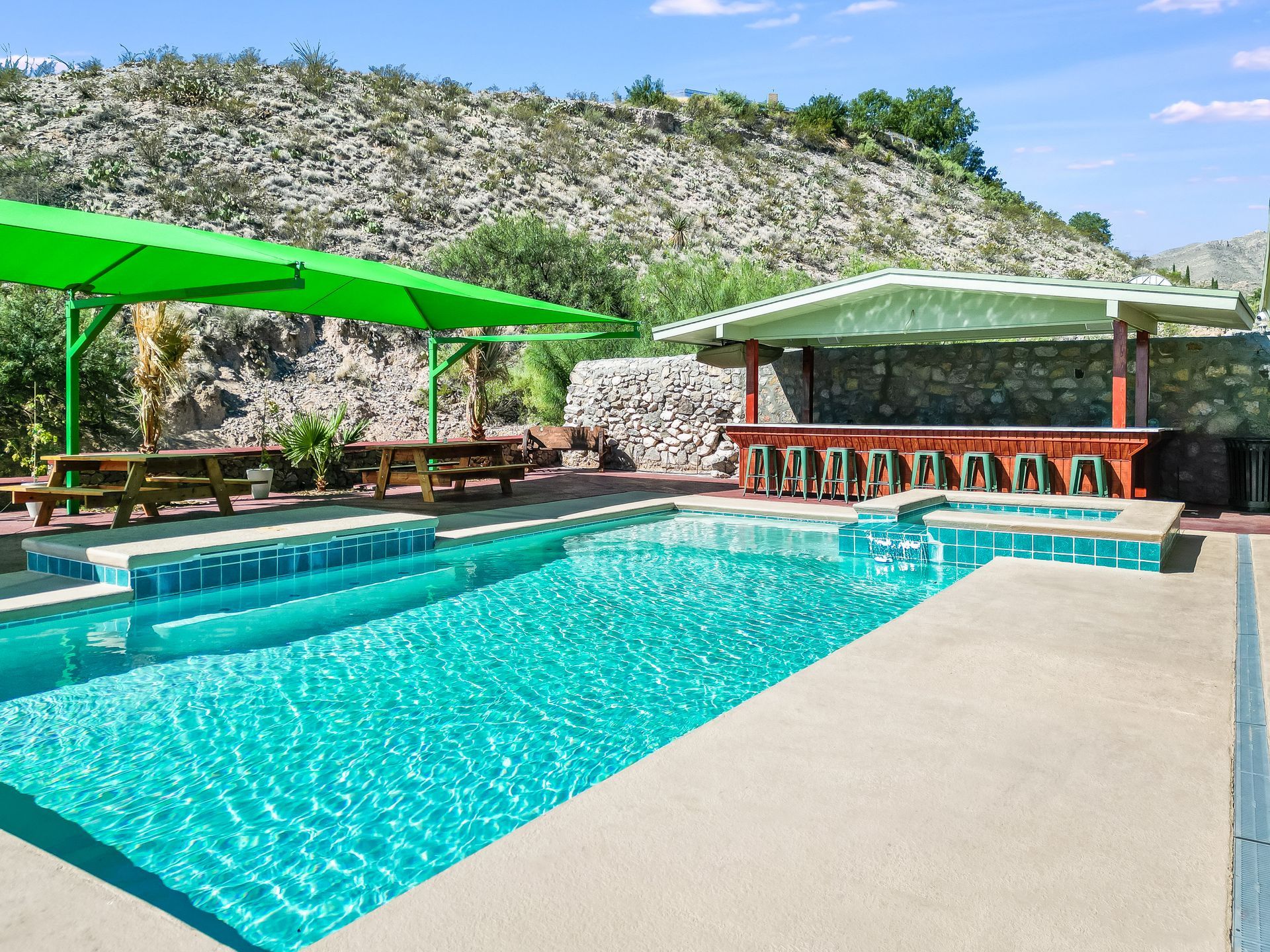 Exterior real estate photo in Northeast El Paso featuring a pool deck.