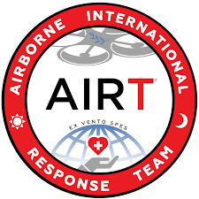 Logo for Airborne International Response Team. Features a drone, globe with a heart, and sun/moon symbols.