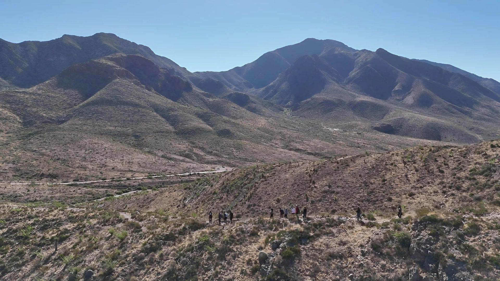 Aerial view of a drone search and rescue operation in rugged terrain near El Paso, captured by From Above Droneworks.