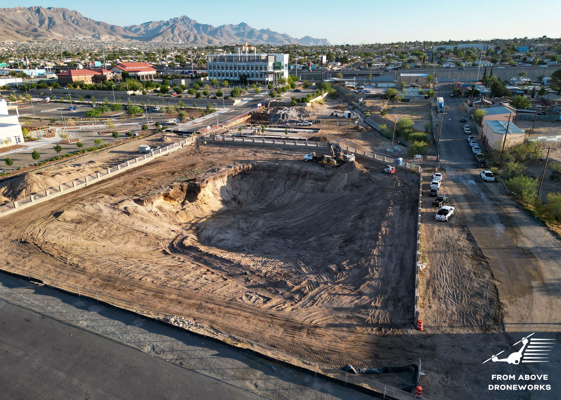 Construction Site Digging: An image capturing heavy machinery, such as an excavator or backhoe.