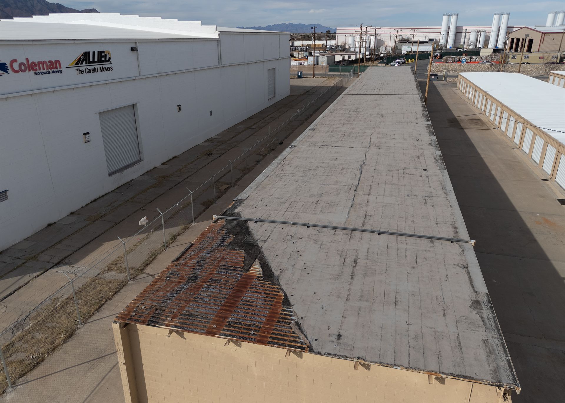 Drone image of a roof inspection in progress, showing detailed views for assessing condition.