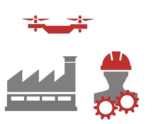 A factory , a drone , a man wearing a hard hat and gears.
