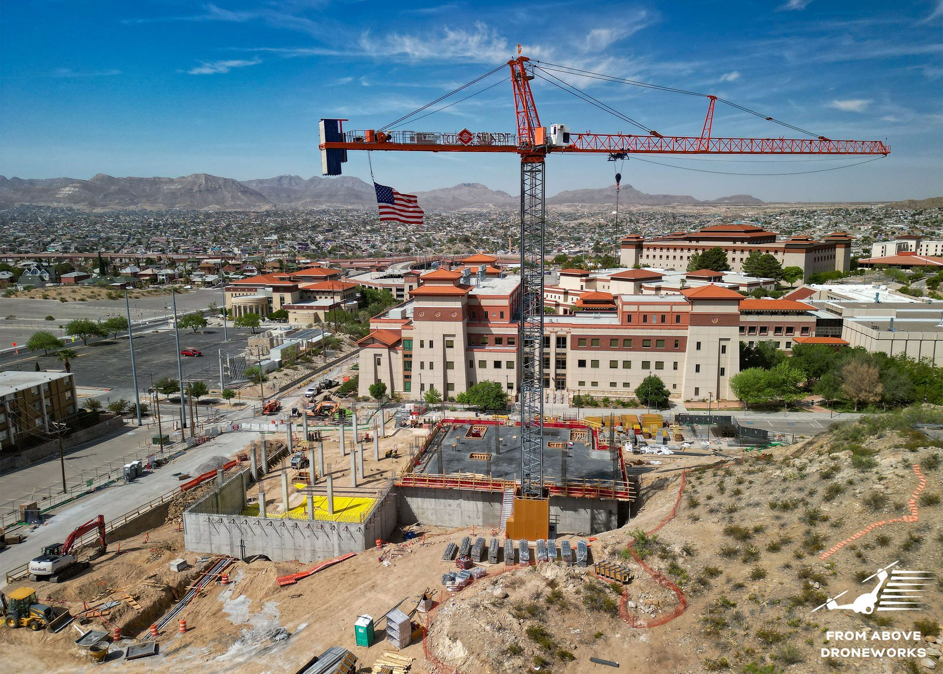 Crane Construction on UTEP Campus: An image capturing a crane in operation at the (UTEP) campus. 