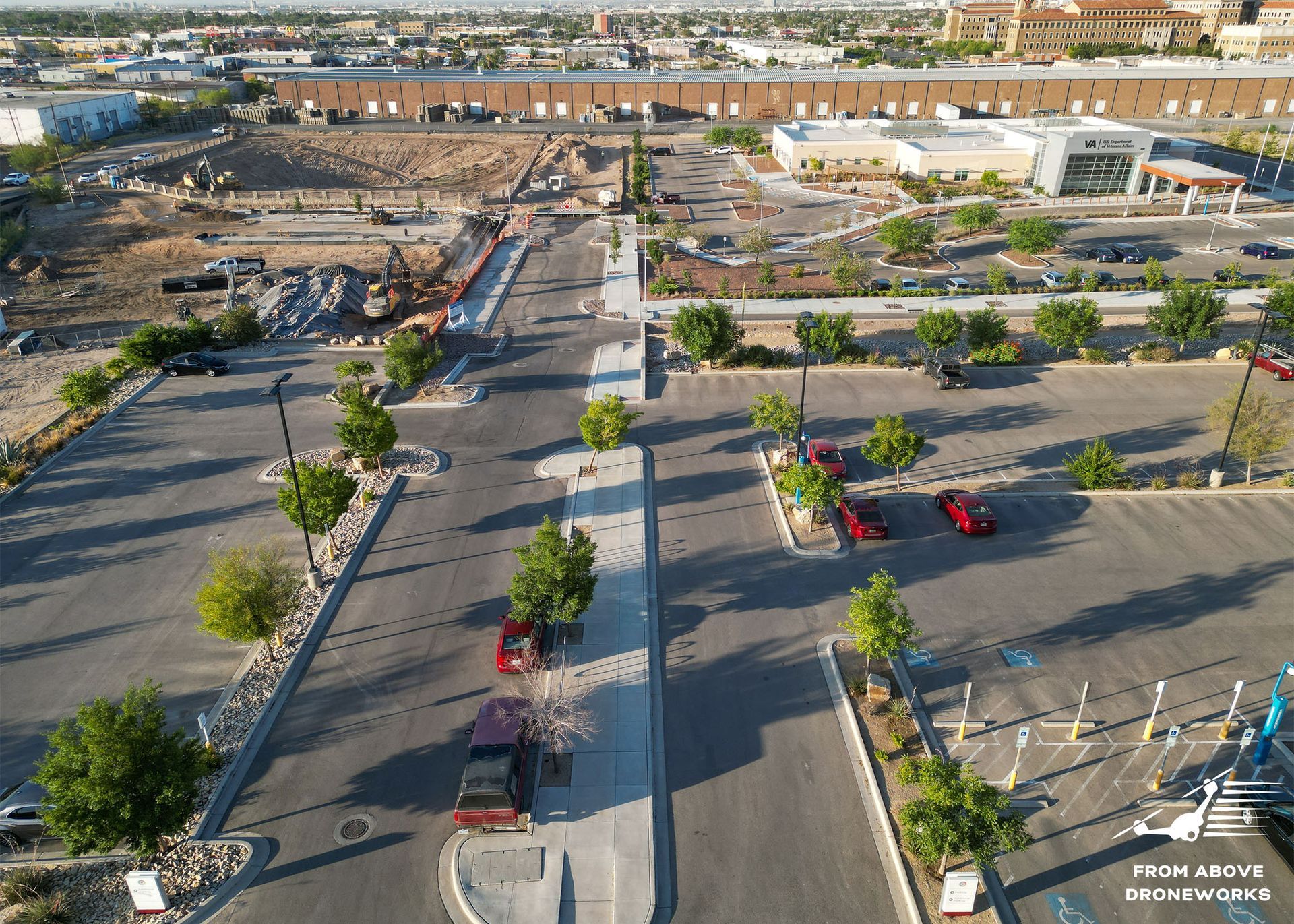 Aerial View of Parking Lot: An overhead image displaying a parking lot from an aerial perspective. 