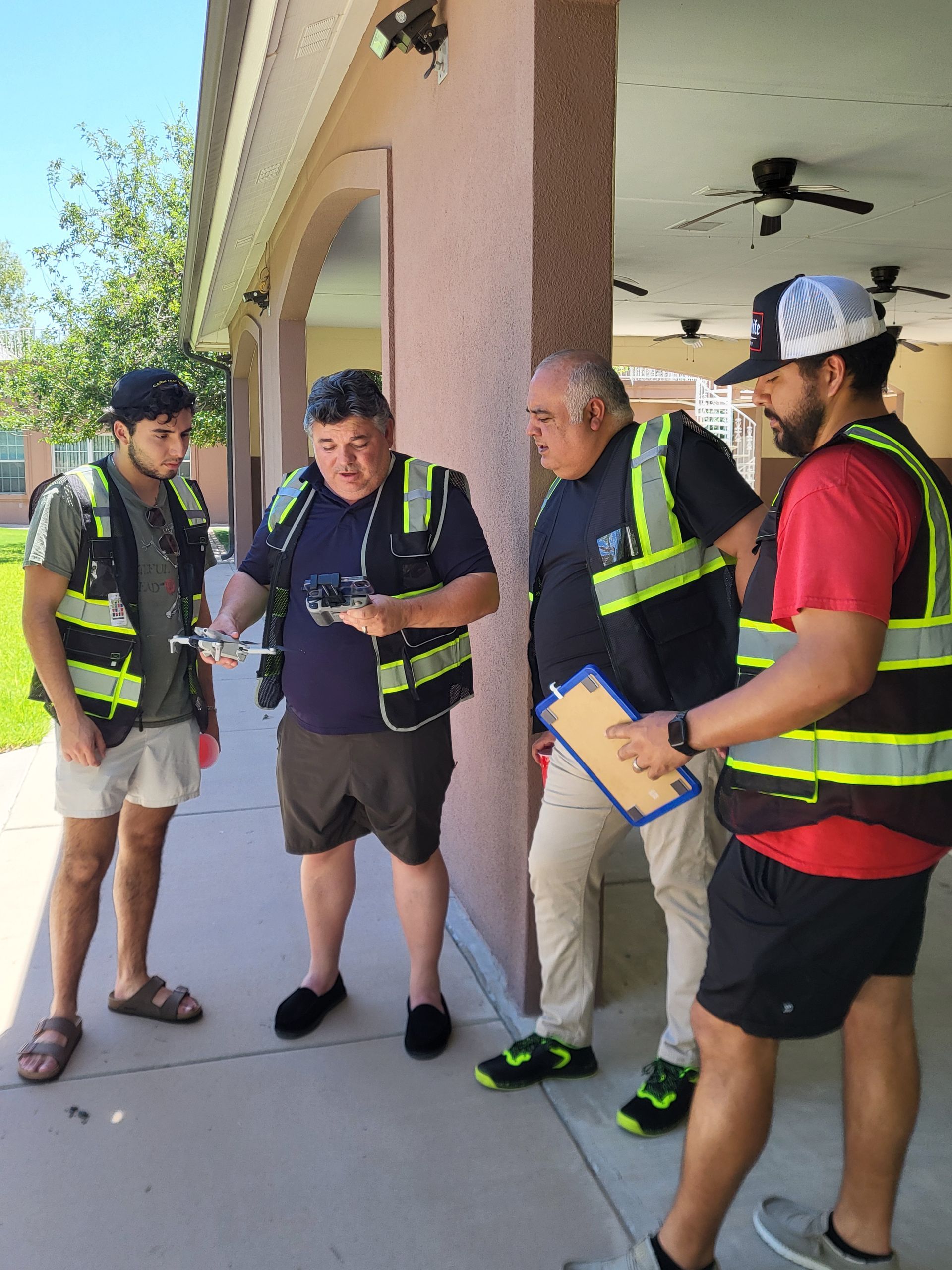 Outdoor drone training session in El Paso with students learning to control small unmanned aircraft