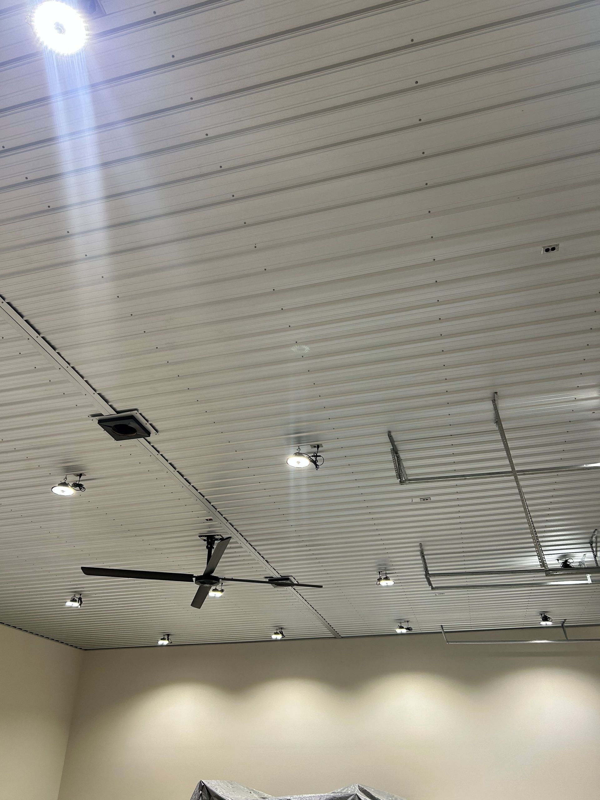 bright outdoor recess lights installed into commercial property ceiling