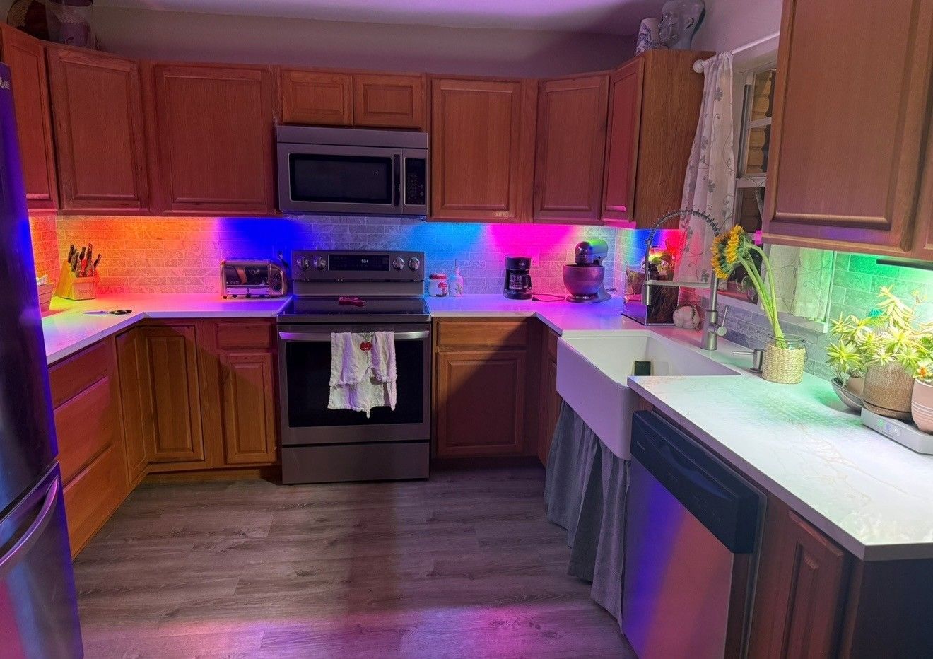 Red, Green, Blue (RGB) recess lights installed under kitchen cabinets in Trinity, FL