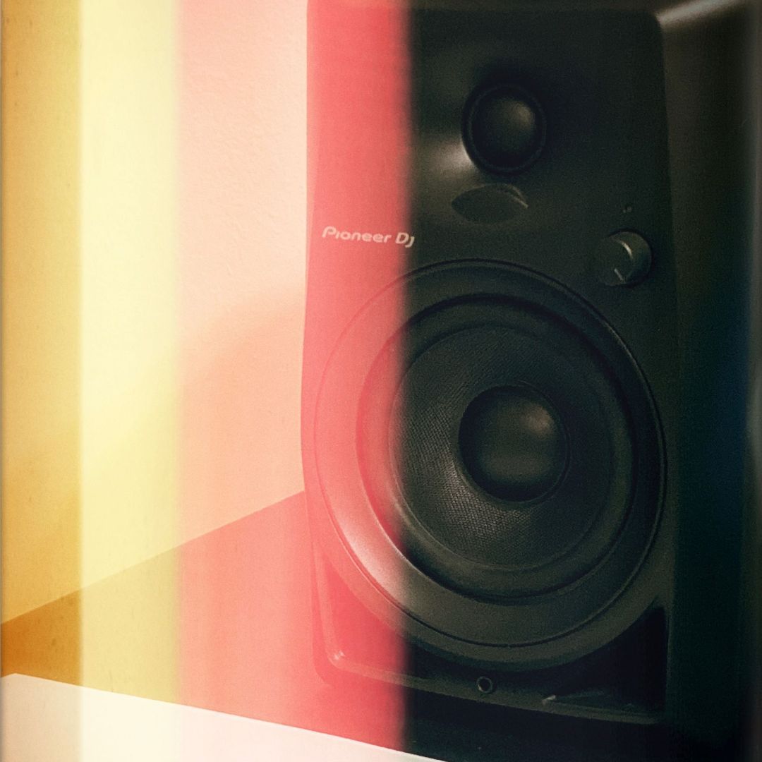 A close up of a speaker that says pioneer on it
