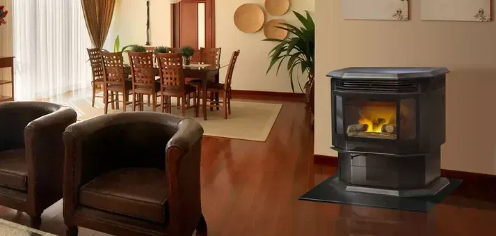 Woman reading in a cozy living room beside a glowing electric fireplace and potted plants