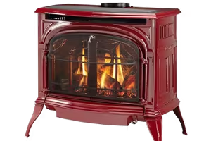 Red cast-iron fireplace stove with a glass front and visible flames inside.