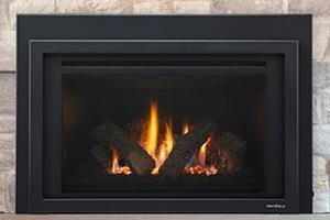 Black modern fireplace with flames burning inside a rectangular frame