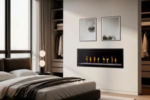 Modern bedroom with a bed, floor lamp, and wall-mounted fireplace beneath framed mirrors.