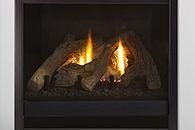 Gas fireplace with glowing flames and ceramic logs in a dark surround