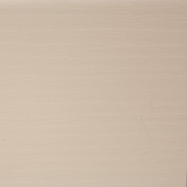 Off-white painted surface with subtle texture.