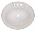 Oval white bathroom sink with three faucet holes.