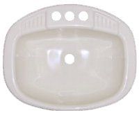 White oval bathroom sink with three faucet holes.
