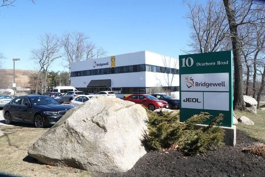 Office park parking lot with sign for 10 Princess Road, Bridgewell, and MSCL