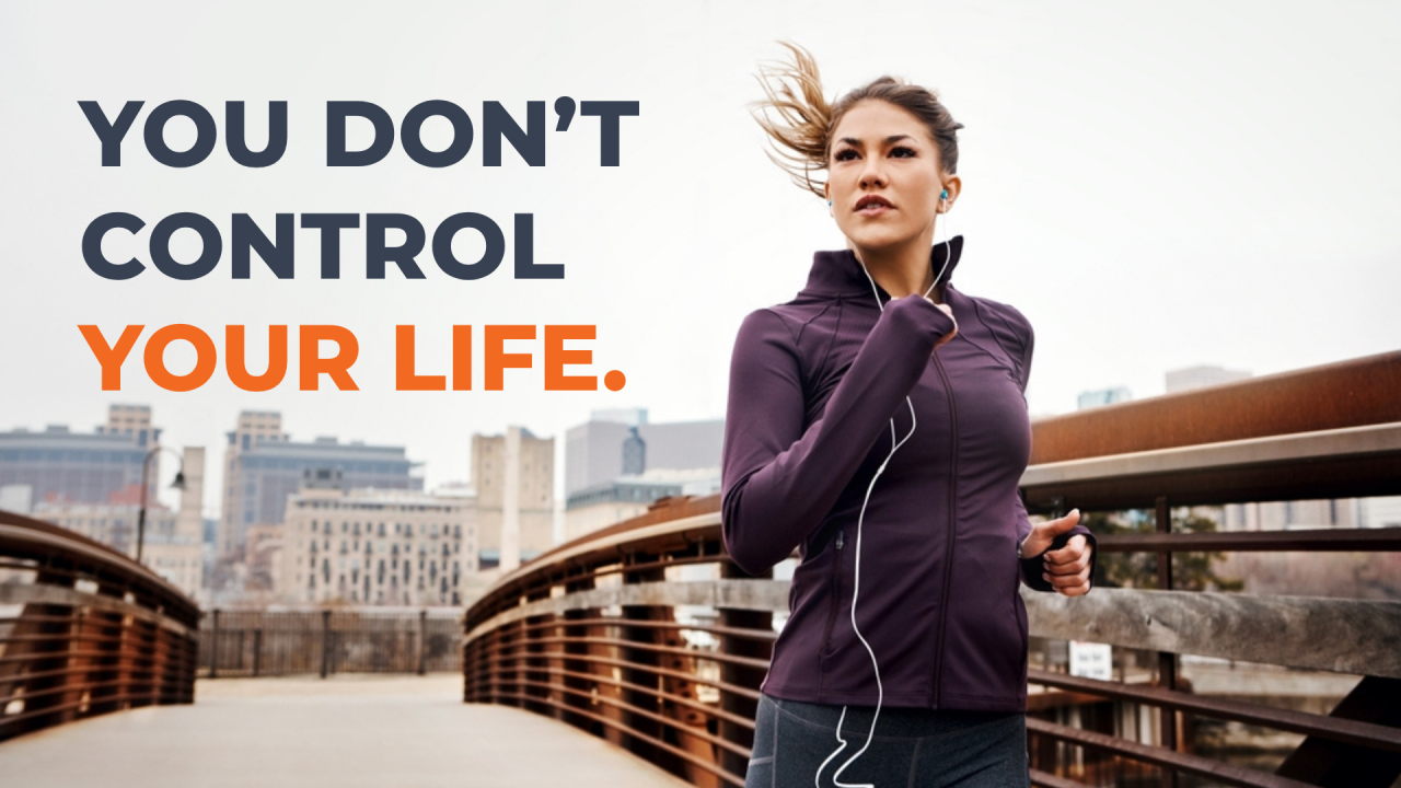 Woman jogging on a bridge with city skyline; text reads, “You don’t control your life.”