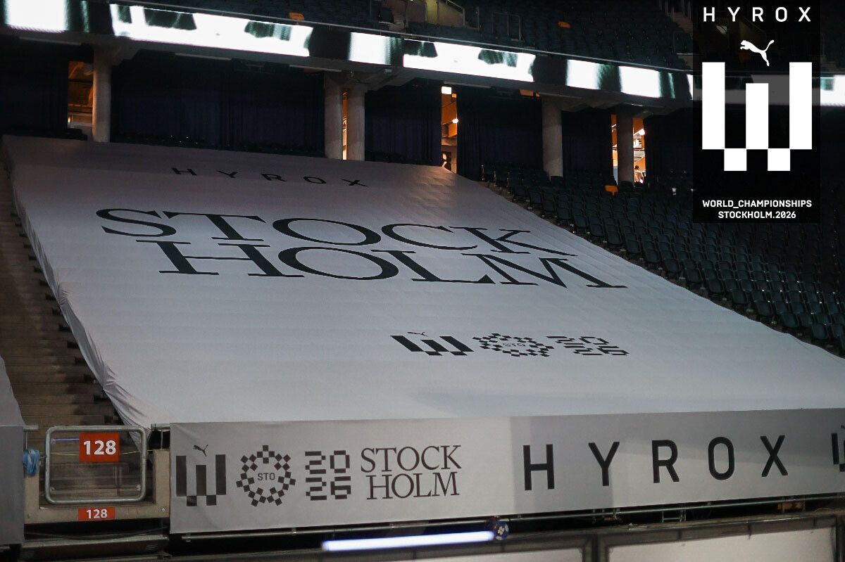 HYROX competition ramp at Stockholm venue with large logo and incline track