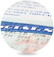A close up of a united states passport in a circle.