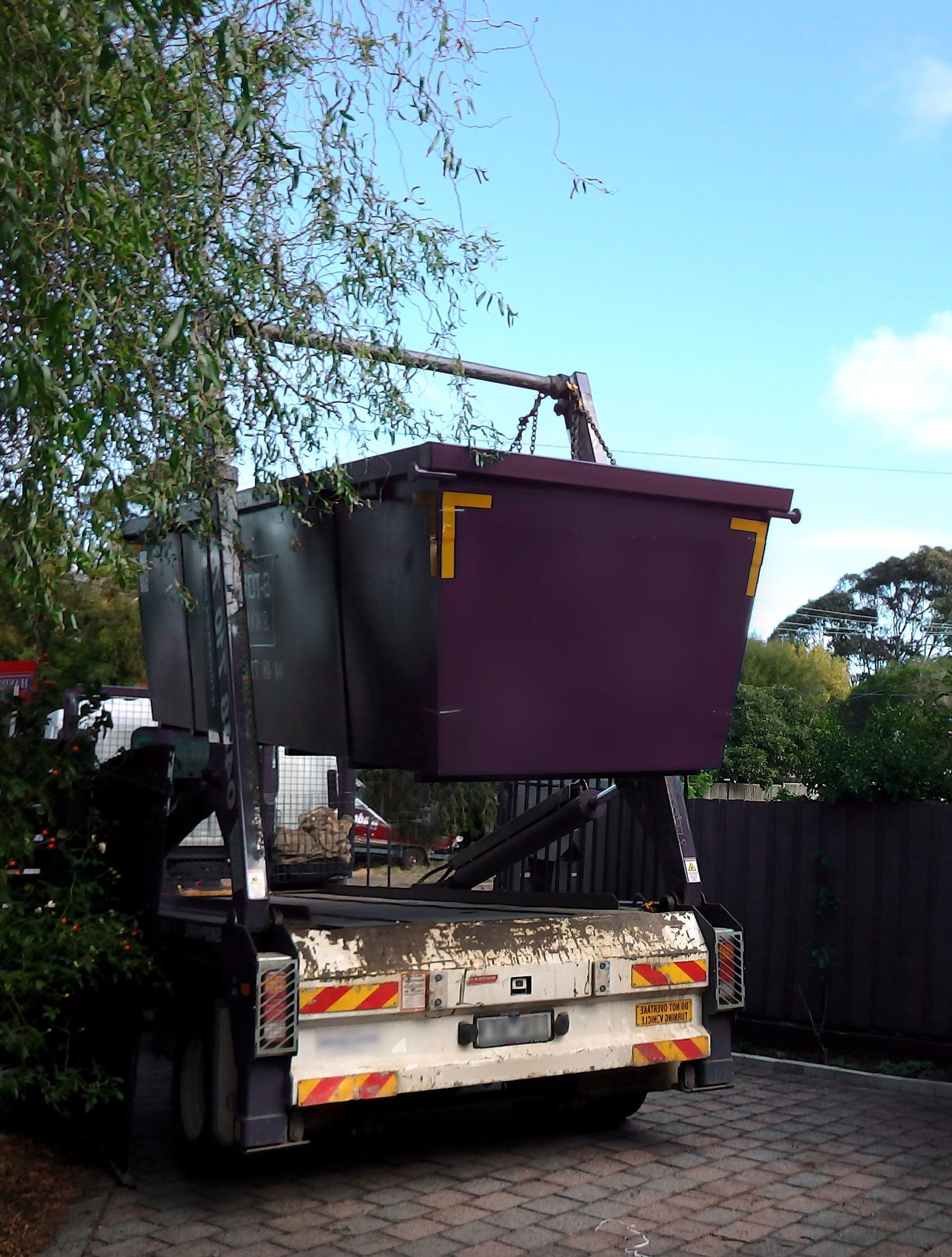 Drop n Go driver checking delivery details in Campbelltown