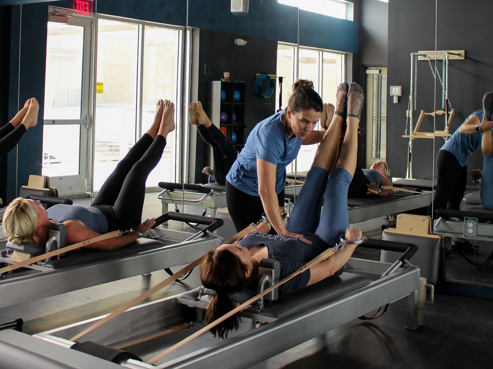 Small Group reformer pilates classes in Metairie, LA | Chronos Fitness | Classical Pilates Studio